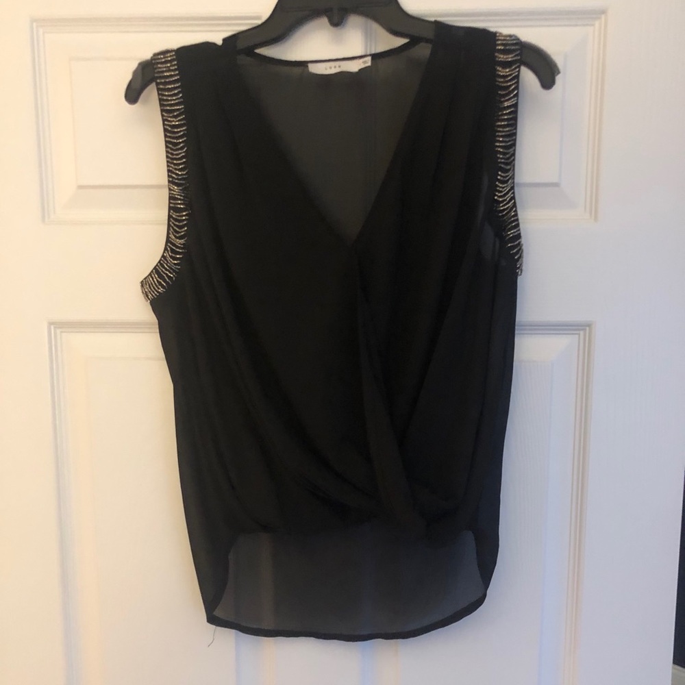Sheer black top with sequin detail